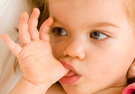 child sucking thumb